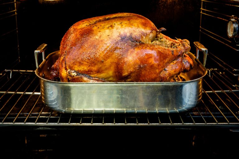 Large Thanksgiving with vaxxed guests or small gathering with unvaxxed guest?