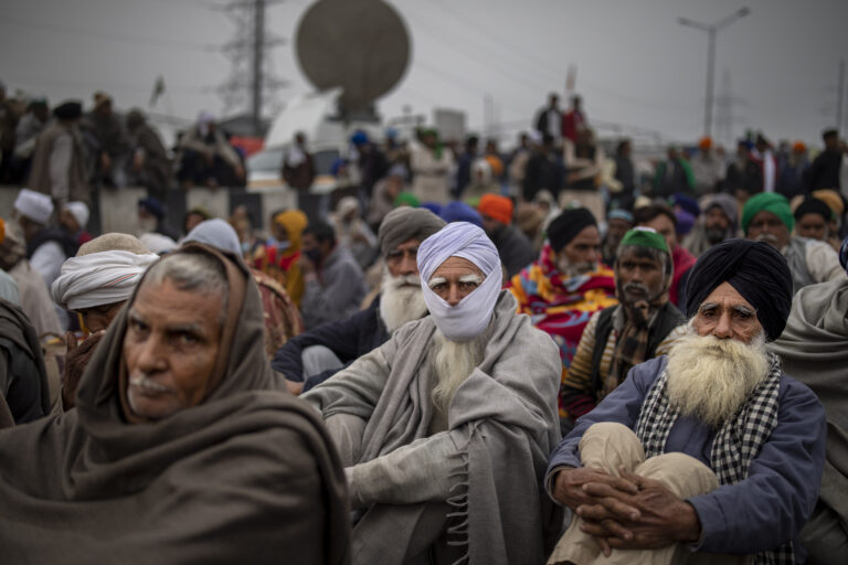 Local community members react to controversial agriculture laws being repealed in India