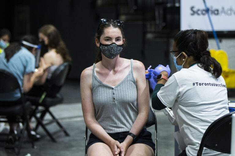 Don’t wait for potential Omicron booster — Delta still dominant, top doctors say