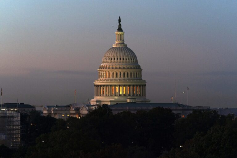 U.S. government avoids shutdown after Republican standoff over COVID-19 vaccine mandates