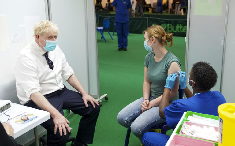 Omicron strains U.K. health services, but no new measures to slow spread: PM Johnson