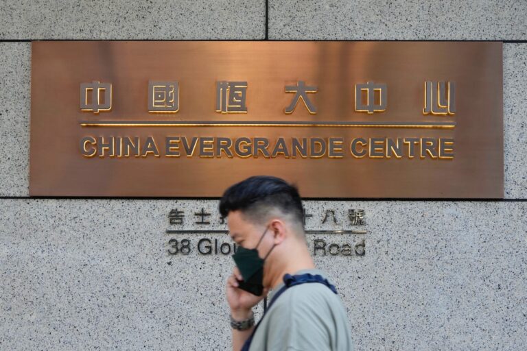 ‘Evergrande, return our money!’: Investors rally outside cash-strapped Chinese firm