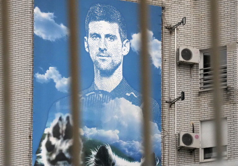 Djokovic held at detention hotel in Australia as he awaits court date