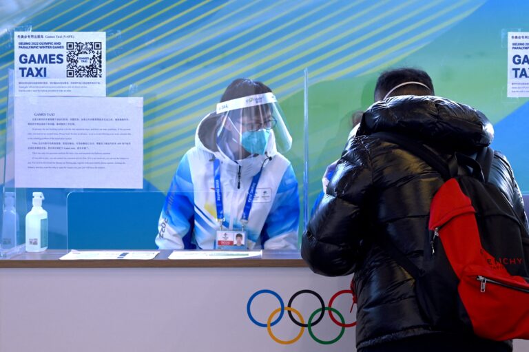 COVID tests and police escorts: What it’s like in Beijing Olympics’ ‘closed loop’