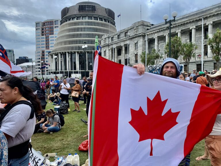 Faced with sprinklers, New Zealand anti-vaccine mandate protesters dig trenches
