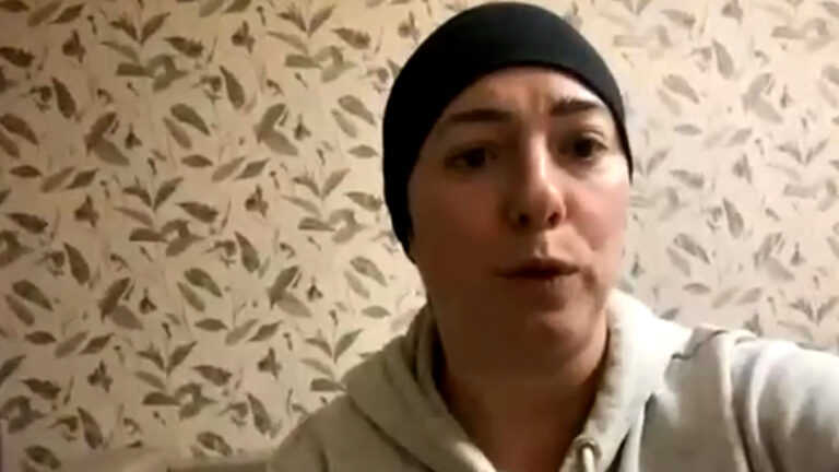 ‘Stop Putin’: Kyiv woman calls for peace as brother, husband join Ukrainian forces