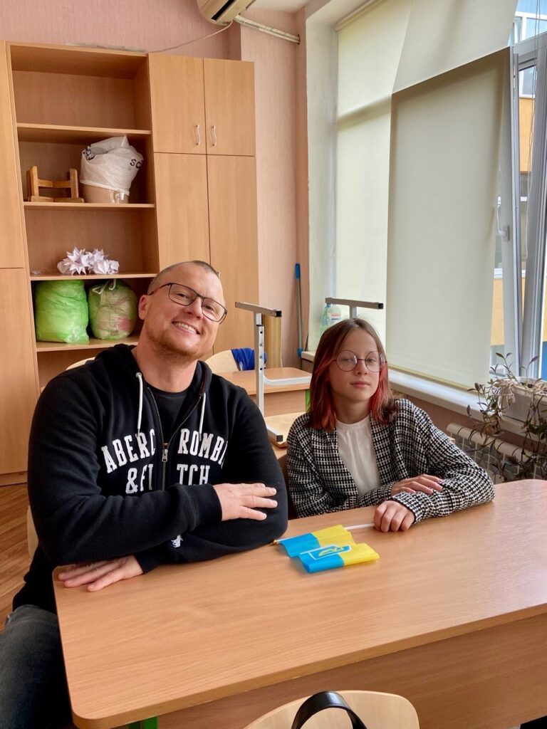 ‘I will defend’: Kyiv man ready to fight as he tries to move daughter to safety