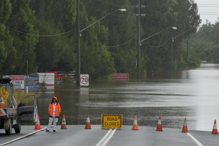 About 500,000 at risk from Sydney floodwaters as heavy rains pummel Australia