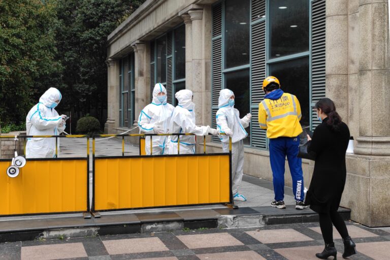 China to lock down Shanghai in two stages for testing as COVID-19 cases spike