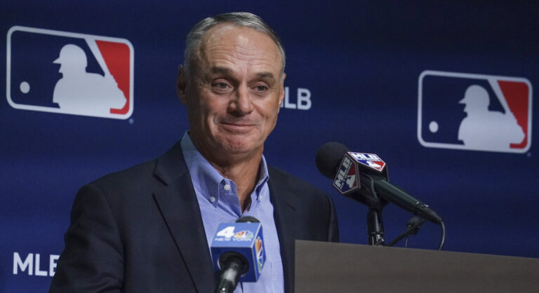 MLB players vote to end lockout, salvaging 162-game season
