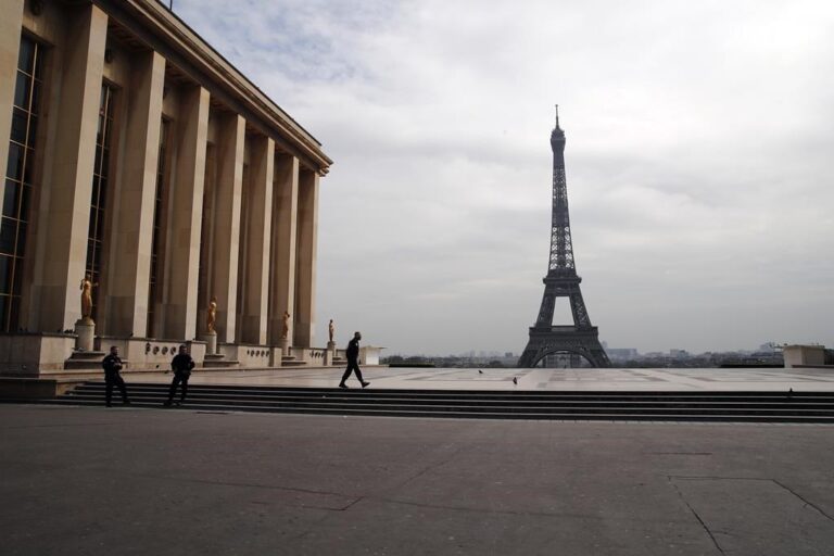 Paris police fire at car driving at them, kill 2