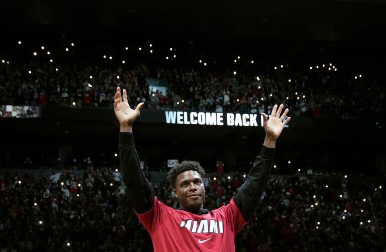 Lowry leads Heat over Raptors in emotional return