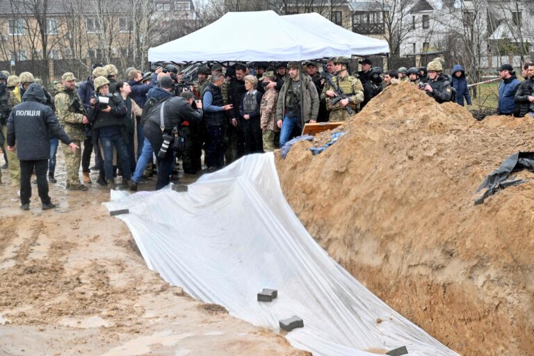 Bucha killings: Ukrainian forensic investigators begin exhuming bodies from mass grave
