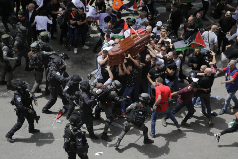 Israeli police charge, beat mourners carrying coffin of slain Al Jazeera journalist