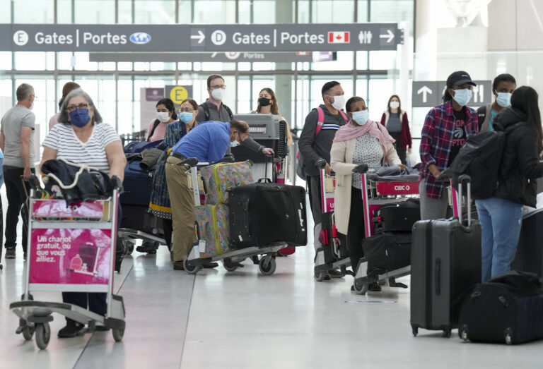 Airport delays are due to COVID-19 rules, industry group says. Do we still need them?