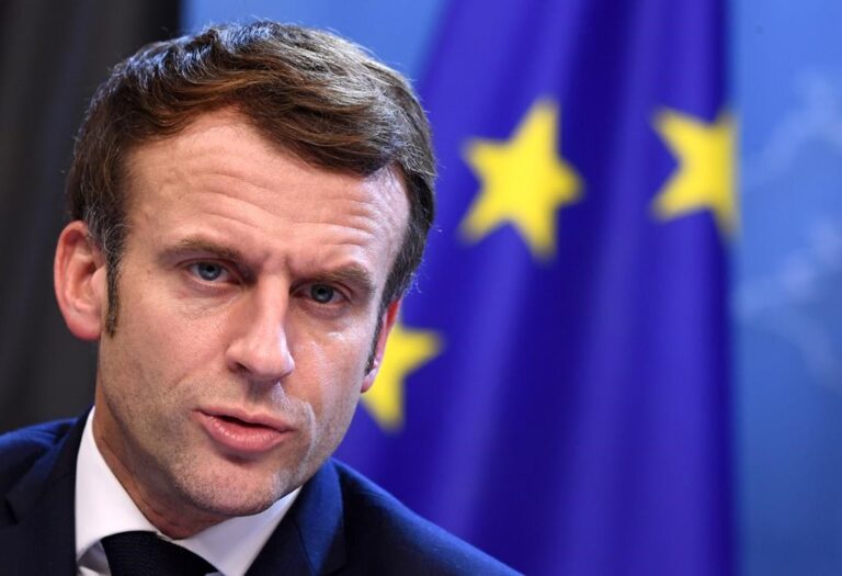 Macron on course to lose absolute majority in parliament, projections show