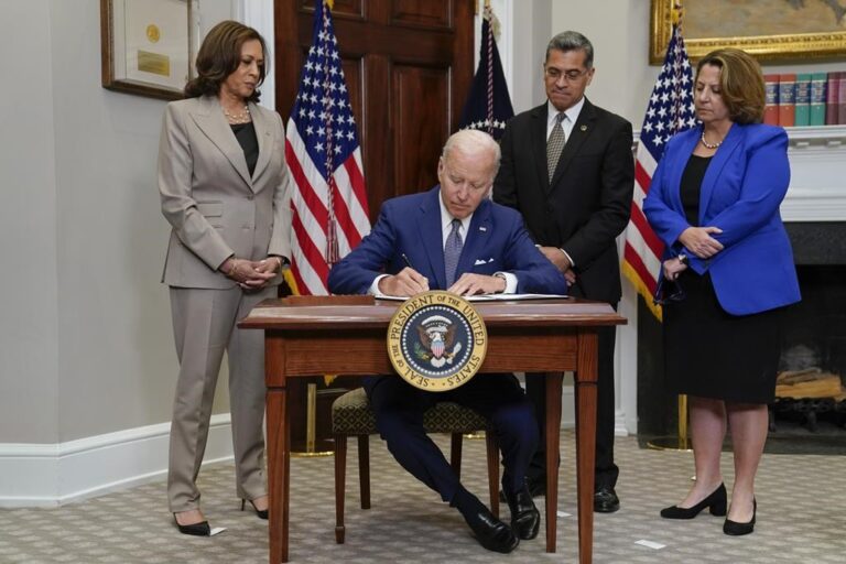 Biden signs order on abortion access, urges women to vote in November