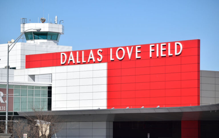 Woman opens fire in Dallas airport, shot and wounded by police, authorities say
