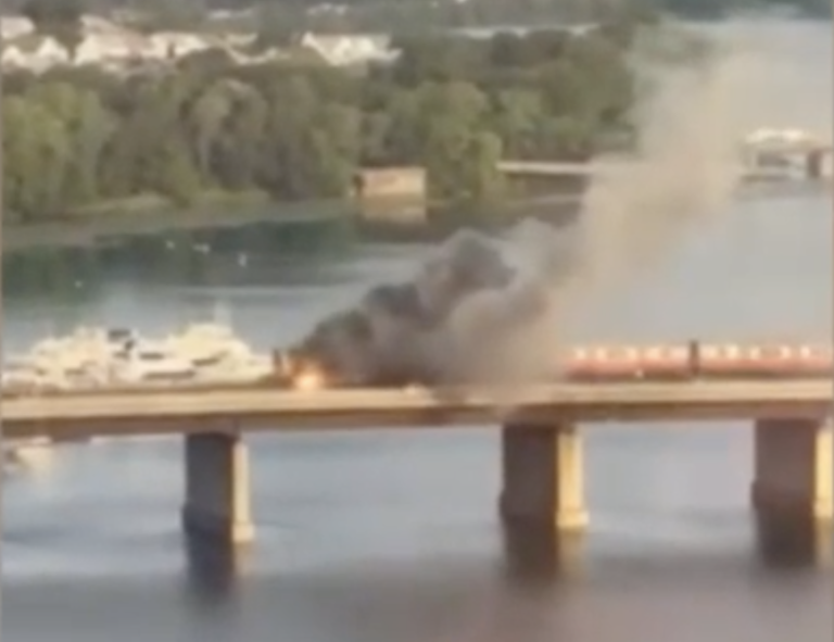 Train bound for Boston catches fire, passengers flee from windows, leap into river