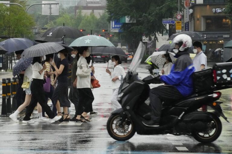 Heavy rains flood South Korea, leaving at least 7 dead and 6 missing