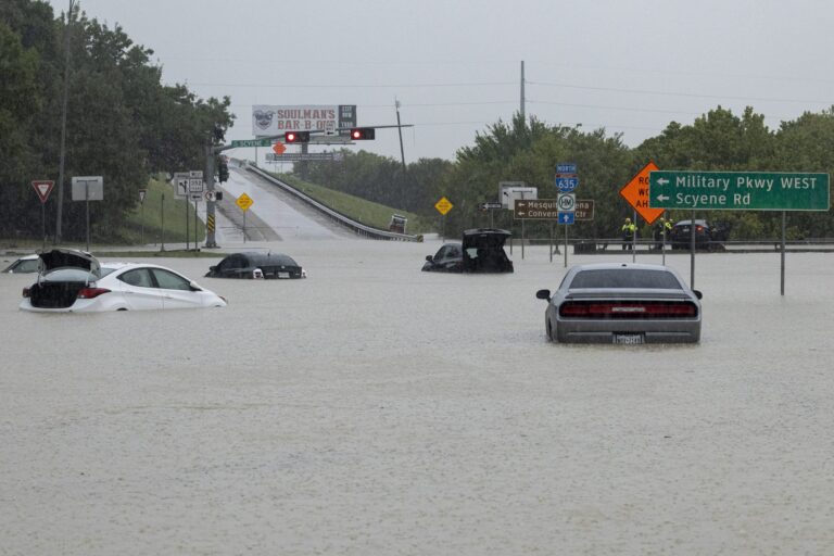 Woman dies in her vehicle as Dallas hit with flooding, heavy rains