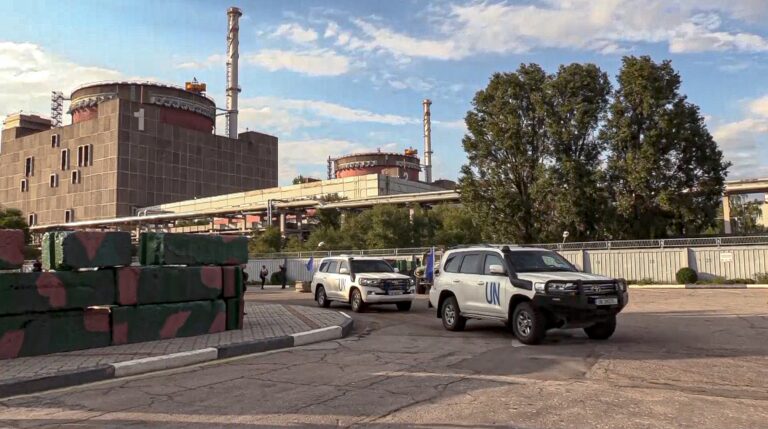 2 UN inspectors to stay at Ukraine nuclear plant as fighting goes on