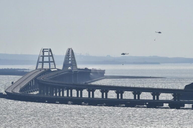 Ukraine war: Russian supply lines hit by blast on Crimea bridge, Putin tightens security