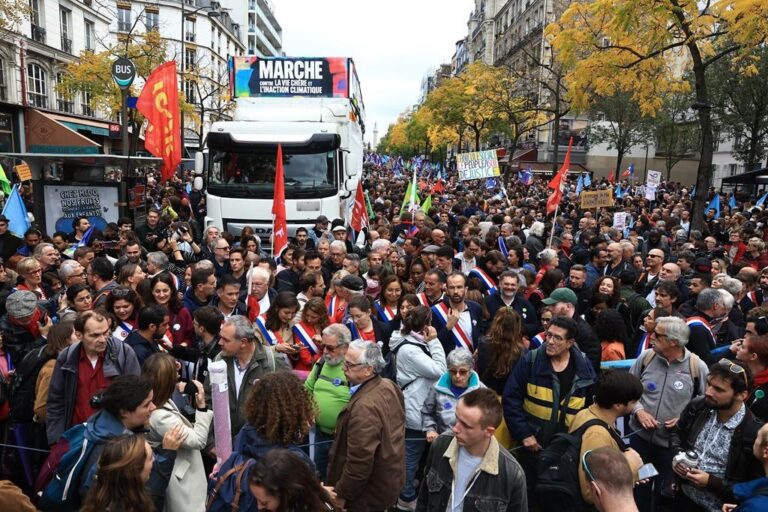 Thousands march in Paris against rising cost of living, climate inaction