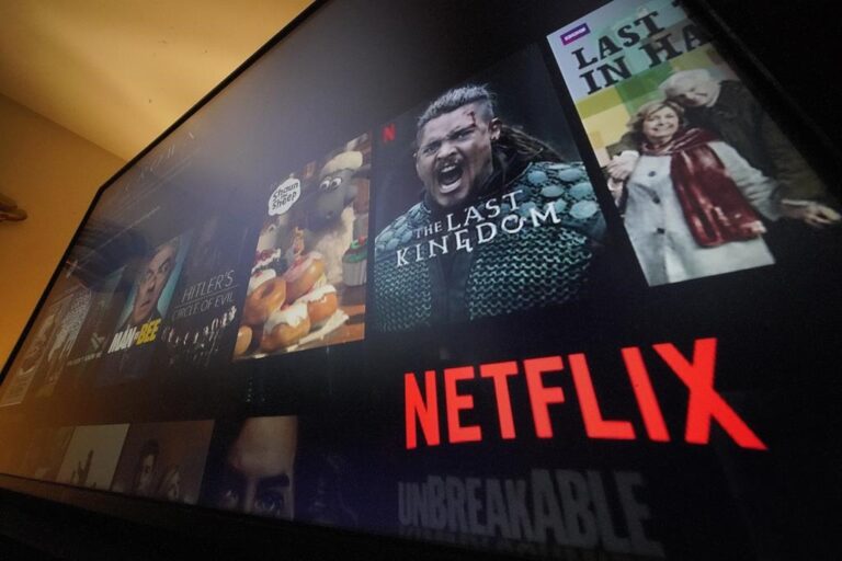 Netflix recovers from subscriber slump, projects gains from advertising option