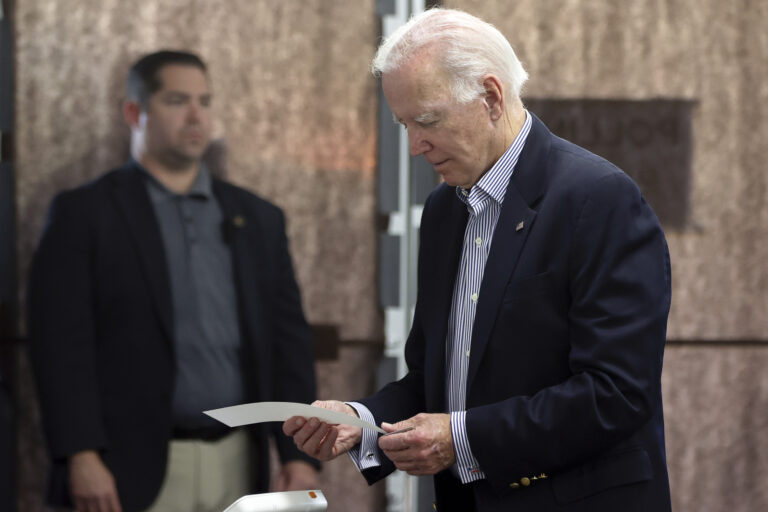 Biden casts midterm election vote early, vows to visit more states in coming days
