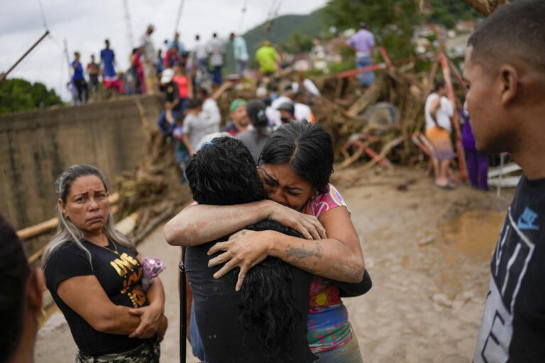 22 dead, dozens missing as rain fueled landslide sweeps through Venezuela town