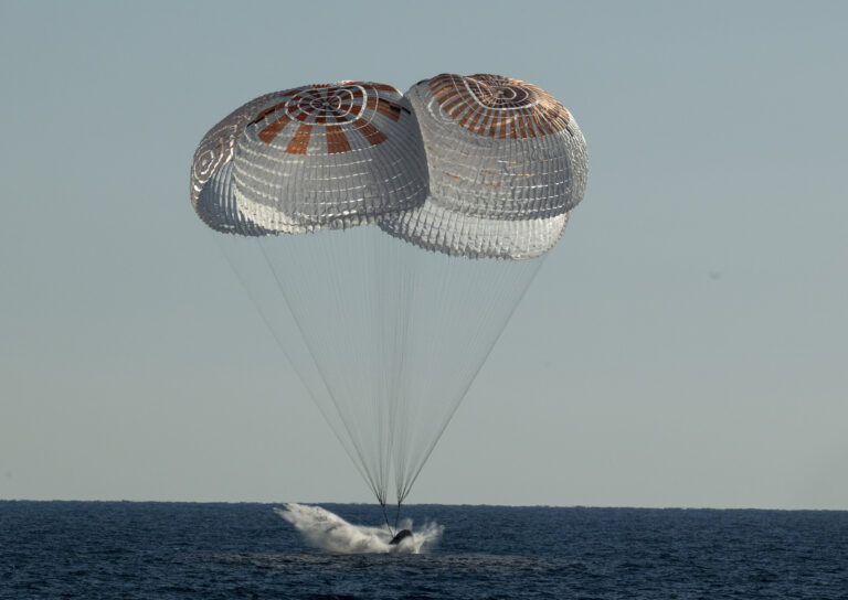 SpaceX astronauts return to Earth after half-year space station mission