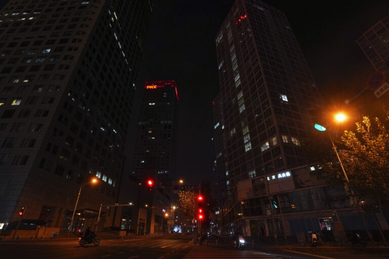 Beijing closes parks, Shanghai tightens entry as China’s COVID-19 cases rise