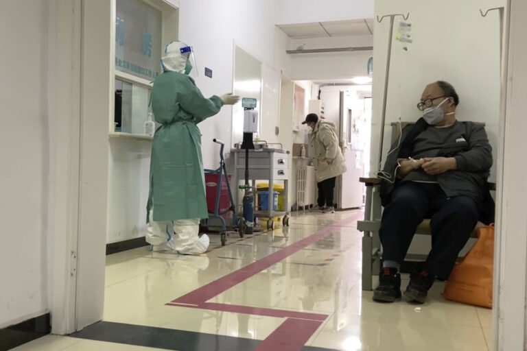 As China’s COVID-19 cases surge, Beijing moves to cut daily case reporting