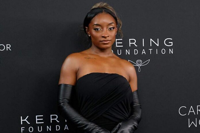 Simone Biles says 3 masked men broke into her Chicago home, stole Porsche